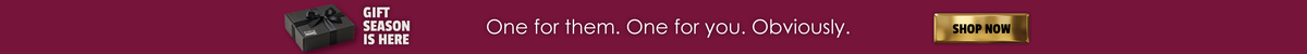 A very narrow banner with a dark red background. On the left is a small black gift box icon with white text reading 'GIFT SEASON IS HERE'.