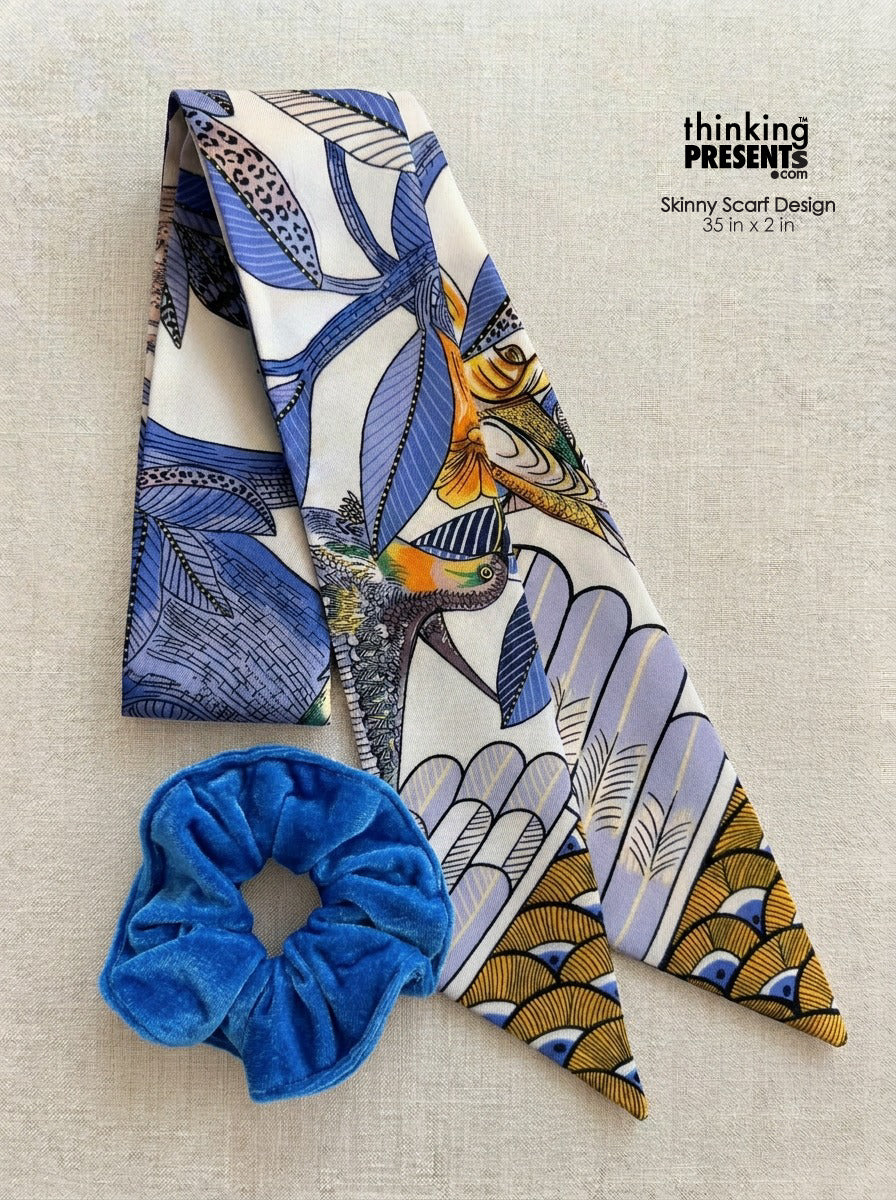 Decorative silky skinny scarf with a blue scrunchie on a beige background