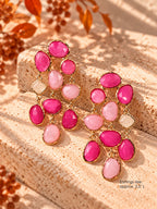 Gold-tone statement chandelier earrings with fuchsia, blush pink, and ivory stones