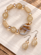 Natural stone stretch bracelet and drop earrings in cream and caramel with faceted glass accents by Thinking Presents