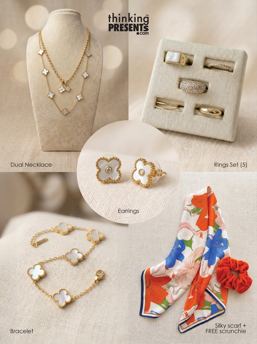 Layered gold-tone necklace with black and white floral accents displayed on a neutral bust, part of the Midnight Bloom Gift Set by Thinking Presents™