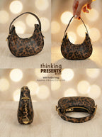 Leopard print mini hobo bag shown from multiple angles with gold hardware and zipper details on a warm neutral background.