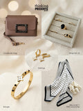 Curated gift set featuring gold-tone star charm earrings, five-piece ring set with black stone accents, structured brown crossbody bag with embellished buckle, gold bangle with star detail, and a polka dot silky scarf with velvet-touch scrunchie, styled as a chic and modern ready-to-gift set