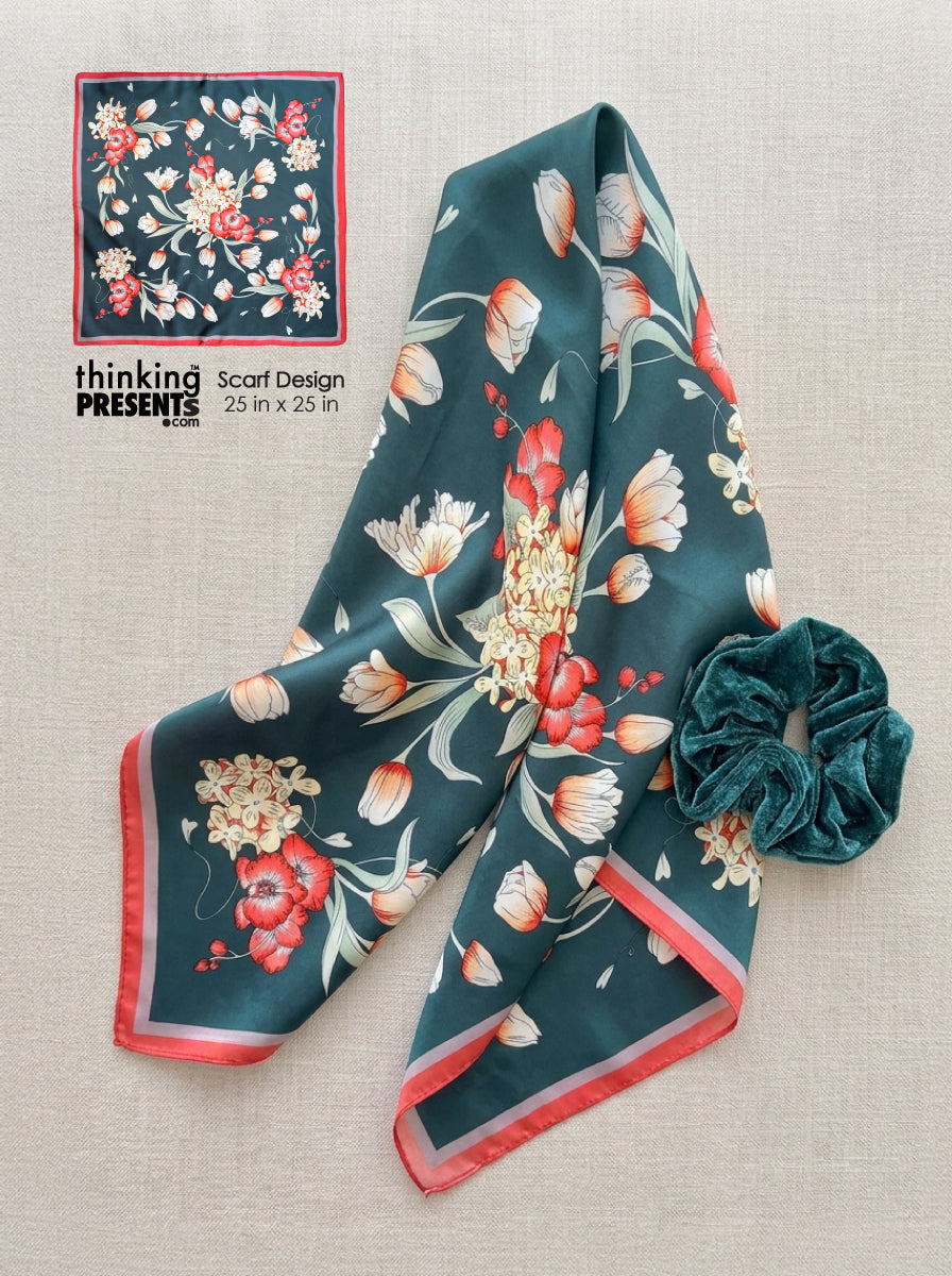 Floral patterned scarf with a matching scrunchie on a textured surface, with 'thinking presents' branding.