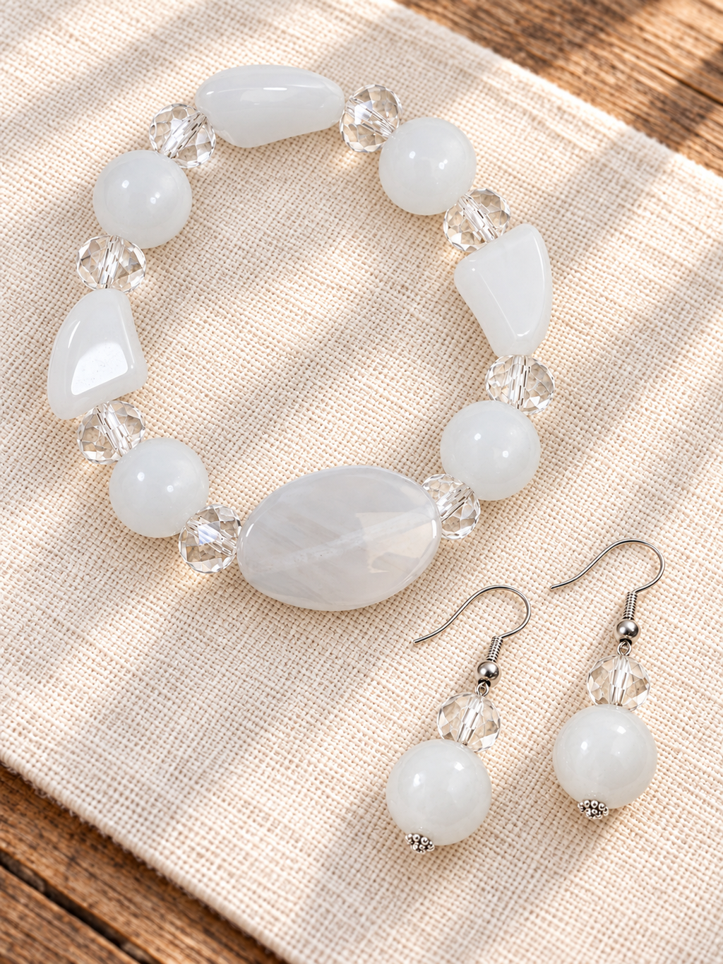 White stone stretch bracelet and drop earrings with grey-veined focal stone and clear glass accents