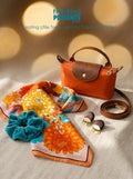 Tangerine mini gift set with orange crossbody bag, wood earrings, retro floral scarf and teal scrunchie