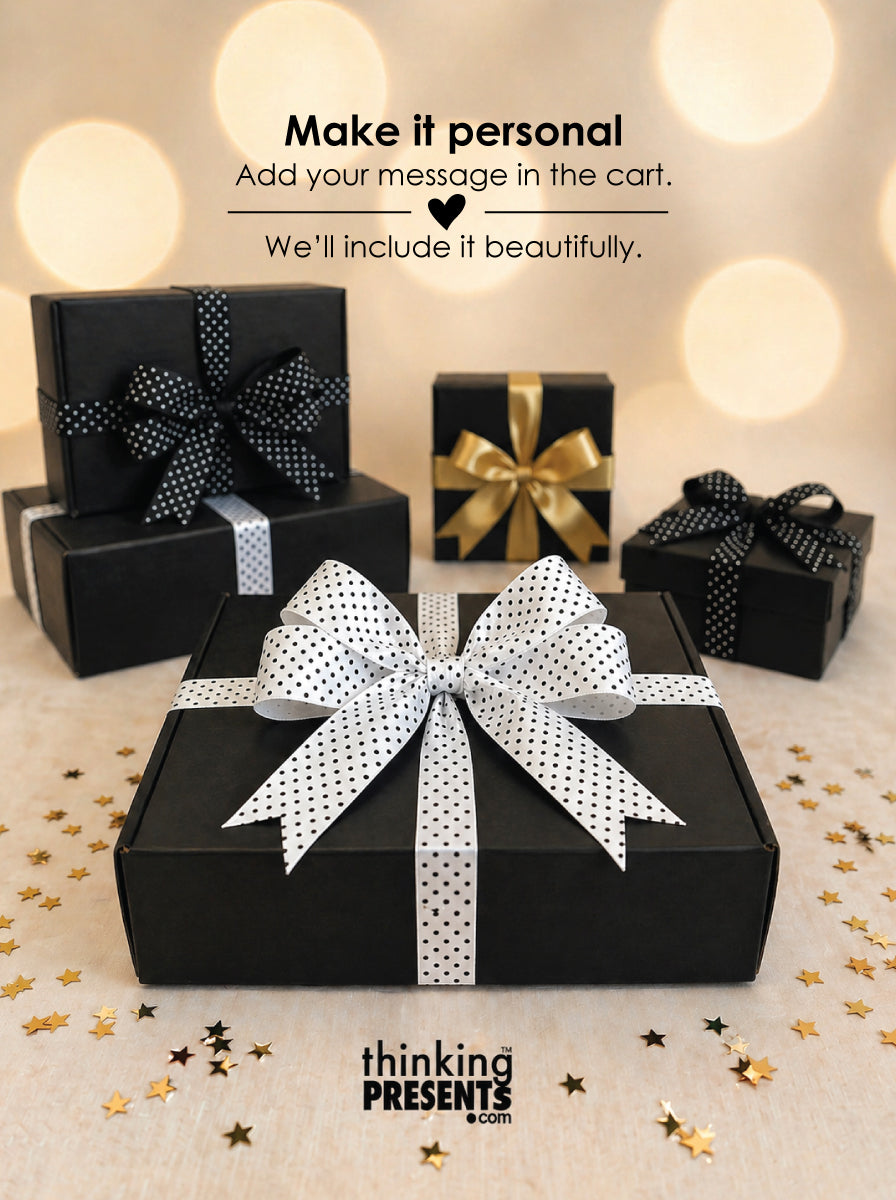 Black gift boxes with decorative bows on a light background, featuring the brand 'thinking PRESENTS'.