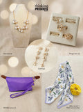 Curated gift set featuring gold-tone floral necklace, matching drop earrings, five-piece ring set, purple wristlet pouch, silky floral scarf, and yellow scrunchie, styled in a feminine, ready-to-gift presentation