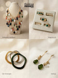 Curated gift set featuring statement gold-tone necklace with cascading multi-color stones, five-piece ring set with green accents, drop earrings, and organic-shaped bangles, styled as a bold earthy ready-to-gift set